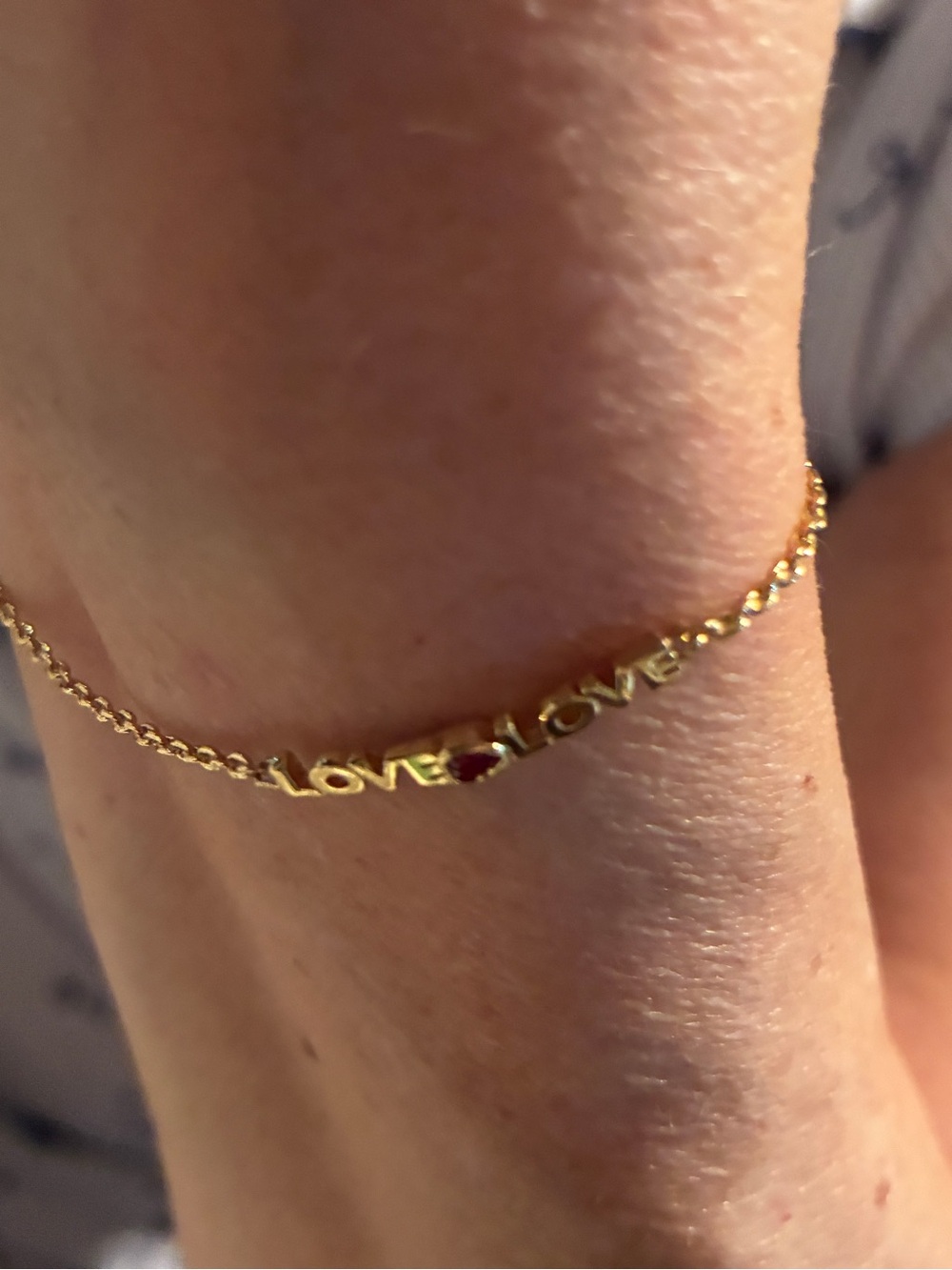 Kate Spade Gold 'LOVE' Chain Bracelet with Ruby Accent
